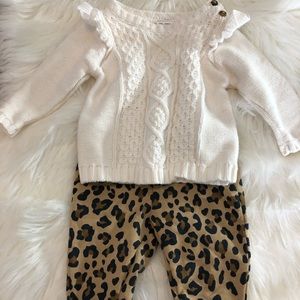 White sweater with leopard pants